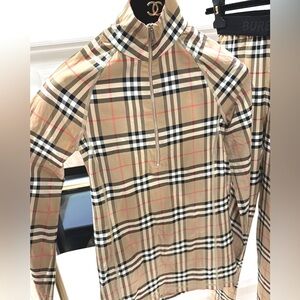 Women's Burberry fitted long-sleeve top in size Small. This is for the top only
